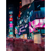 digital signs at night in a busy city